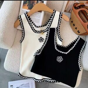 Elegant Black and White Sleeveless Top